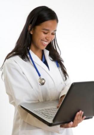 Veterinarian checking on patient chart 